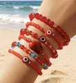 Set di braccialetti boho multistrato in perline rosse con accenti dorati e evil eye - Set di 6 Pezzi Rosso Brillante Cuore Malocchio con Perline(30259-bra-red)