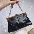 Elegant black pleated faux leather clutch bag with thick gold chain handle and metal frame - Black