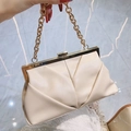 Elegant cream white evening clutch bag with ruched texture and gold metal chain handle - Apricot