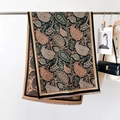 Detailed view of the intricate paisley pattern and fine fringe trim on this shawl - Classic Paisley Black Coffee Edge