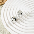 Macro detail of silver geometric earrings with a polished hammered texture on white tray - Mirror Polished Hemisphere Studs (28578-6-silver)