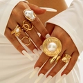 Close-up of vintage gold irregular metal rings set with large white pearls on a hand - Gold Vintage Large Artificial Pearl Set (30421-ring-G)