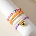 Dettaglio del set di 5 bracciali stile bohémien con perline colorate e ciondoli marini - Cuore Viola Colorato Set da 5 pezzi (29269-colour)