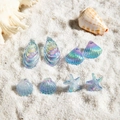Orecchini cangianti con ciondoli a stella marina e conchiglia su sabbia bianca - Stile Mix Creature Marine (29348-blue)