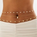 Detailed view of layered gold body chain with butterfly charms and pearl beads on waist - Gold Style (29752-G)