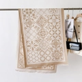 Sciarpa beige elegante in simil cashmere con motivi floreali e frange decorative - Cachi