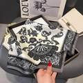 French style floral print 100% mulberry silk scarf displayed on a luxury tray background - Black (ZC-318)