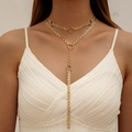 Close-up of golden double-layer Y-shaped necklace with rings on a female model - Gold Square Chain Style (30594-nek-G)