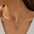 Close-up of a gold vintage cross pendant necklace with white zircons on a model - Zirconia Grain Texture Cross (30739-nek-G-3)