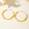 French retro gold beaded hoop earrings featuring yellow resin beads and shell accent - Yellow