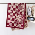 Plaid knitted scarf with red and beige floral pattern and fringe in chic style - Red