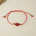Detail of red Evil Eye beaded bracelet with gold metal beads and adjustable cord - Red Braided Rope (30532-bra-red-1-EP)