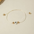 Detail of white woven Evil Eye bracelet with gold beads and protective amulet charm - Trans White Braided Rope (30532-bra-tran-7-EP)
