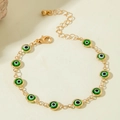 Detail view of gold beaded evil eye bracelet with green charms and lobster clasp - Green Beaded Chain (30720-bra-green-3-EP)