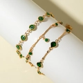 Detailed view of bohemian gold chain set with green evil eye and emerald gemstone charms - Green 3Pcs Set (31277-bra-green-EP)