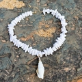 Bohemian style necklace featuring white crushed stone beads and a spiral shell pendant - White Stone Spiral Shell Pendant Necklace (29283-white)