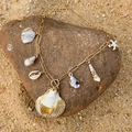 Bohemian gold chain necklace featuring seashell charms and starfish on a natural rock - Gold Starfish Shell Pendant Clavicle Chain (29284-3-G)