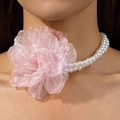 Close-up of double-strand pearl choker with a large pink organza flower detail - Pink