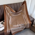 Detail of square silk scarf featuring a brown geometric labyrinth and golden chain motifs - 90*90cm / Coffee