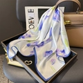 Detail of silk scarf with lotus print, purple iris motifs, and deep blue borders - 100% Mulberry Silk / 65x65cm / Purple