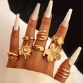 Bohemian gold ring set featuring nine vintage shell, starfish, and flower designs - Gold Bohemian Totem 9-Piece Set (30403-ring-G)