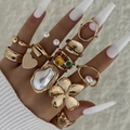 Vintage gold geometric ring set featuring irregular pearls and colorful gemstones on a hand - Gold Bohemian Artificial Pearl Flower Set (30412-ring-G)