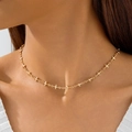 Elegant gold layered necklace with multiple cross pendants shown on female model - Gold Simple Small Cross Choker (30740-nek-G-1)