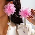 Detailed view of pink floral earrings with long gold chains and faux pearl tassels - Pink