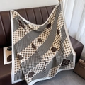 Close-up of elegant silk scarf with houndstooth and floral pattern on leather sofa - 90*90cm / White Edge (XW-173)