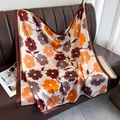 Elegant floral print square silk scarf with daisy patterns on a vintage leather sofa - 90*90cm / Coffee Edge