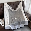 Elegant silk-like square scarf with black and white geometric patterns on a leather sofa - 90*90cm / White