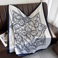 Elegant vintage floral satin square scarf with navy border draped on a sofa - 90*90cm / DM-26-White