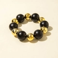 Detailed view of elastic bracelet with matte black and polished gold acrylic beads - Black Gold Round Beads Style (31229-bra-G-EP)