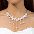 Irregular pearl necklace with silver chain tassels worn by model for elegant styling - Tassel Irregular Pearl Style (30993-nek-S-EP)