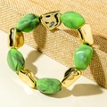 Detailed close-up of green marble-patterned beads and textured gold metal elements on the bracelet - Green Marble Pattern Bead Bracelet (31598)