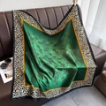 Elegant satin green floral silk scarf with leopard print border on a leather sofa - 90*90cm / Green Floral Leopard Patchwork (DM-50)