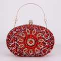 Luxurious ruby red crystal shell clutch with sparkling floral rhinestones and round handle - Red