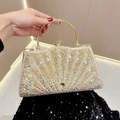 Borsa da sera dorata con strass scintillanti e un manico semicircolare in metallo dorato - Oro