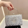 Pochette da sera con strass argento, manico tondo in metallo e cristalli scintillanti - Argento