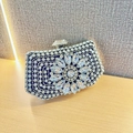 Silver rhinestone evening clutch bag with radial crystal flower pattern on a hard shell - Black