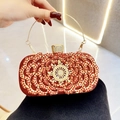 Sparkling red rhinestone clutch evening bag with gold handle and radial crystal pattern - Red