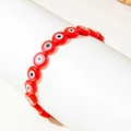 Vibrant red Evil Eye beaded elastic bracelet on a white minimalist display stand - Red (30505-bra-red)