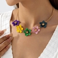 Macro shot of colorful enamel flower necklace with gold chain on model neck - Five Color Flower Enamel Gold Thin Necklace (29834-nek-colour-12)