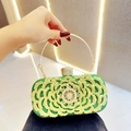 Emerald green evening clutch bag with gold hollow floral pattern and crystal accents - Green