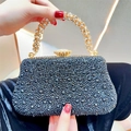 Elegante borsa da sera nera con strass scintillanti e chiusura in perla dorata di lusso - Nero