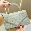 Elegant ivory evening clutch with pearls and rhinestones, featuring a gold twist handle - Gold