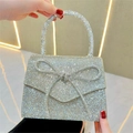 Pochette in strass argento scintillante con grande fiocco in cristallo e manico - Oro