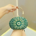 Elegante smaragdgrüne Strass-Abendtasche mit goldenem halbkreisförmigem Metallgriff - Grün
