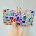 Detail of luxury evening clutch bag featuring colorful rhinestones and a large pearl clasp - Silver Base Colorful Zircon