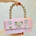 Elegant pink satin evening clutch with rhinestone butterfly and silver beaded handle - Pink